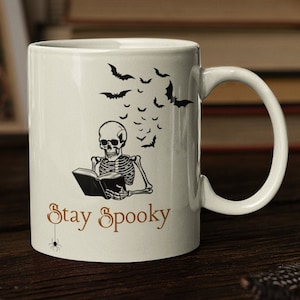 Stay Spooky Mug | Reading Skeleton
