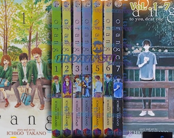 May include: A collection of manga volumes, featuring the series "Orange" by Ichigo Takano. The spines are color-coded and numbered 1-7. The covers depict illustrated characters in various scenes, with the title text in orange.