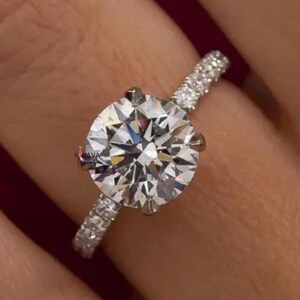 VVS1 Clarity Moissanite Diamond Round Cut Ring Engagement Ring Wedding Ring Forever One Solitaire in 14k Gold with Half Eternity Pave Band