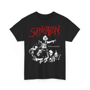 May include: Black t-shirt with a red "Suffocation" band logo and a white graphic of a monster with the text "Reincarnated" underneath.