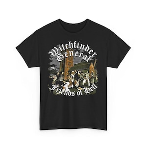 May include: Black t-shirt with a graphic print of a church and people in front of it. The text "Witchfinder General Friends of Hell" is printed on the shirt.