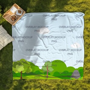 May include: A blue picnic blanket with a green and white landscape design. The blanket has the text "Overlay Mockup PNG" repeated throughout the design.