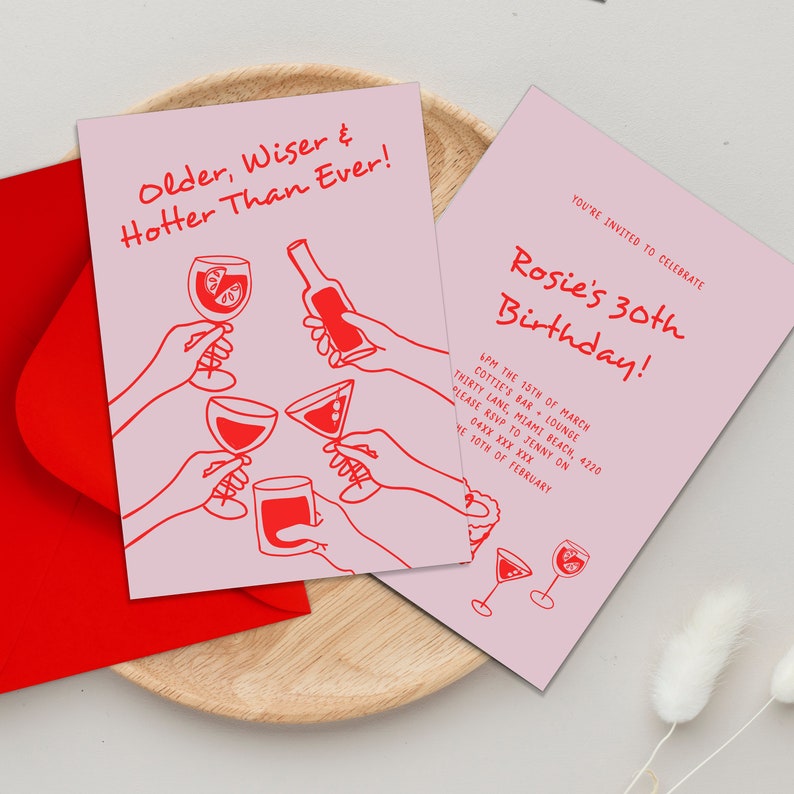 May include: A pink invitation card with red text that reads "You're invited to celebrate Rosie's 30th Birthday!"  The card also includes details about the event, including the date, time, location, and RSVP information.
