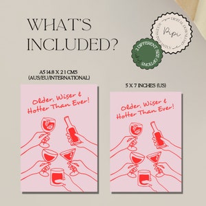 May include: Two printable digital downloads of a pink card with red line drawings of hands holding glasses and a bottle. The text on the card reads "Older, Wiser & Hotter Than Ever!" The card is available in two sizes: 5x7 inches and A5 (14.8 x 21 cm).