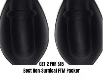 May include: Two black, matte-textured, teardrop-shaped silicone packers with a cylindrical protrusion and a raised ring detail. The text below reads: GET 2 FOR $15 Best Non-Surgical FTM Packer. The items are presented side-by-side against a white background.