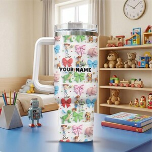 Cheerful Personalized Tumbler, Toy Story Custom Name Tumbler with Straw, Insulated Cup Travel Mug, Girl Birthday Gift Magical Outfit Trip 20 image 2