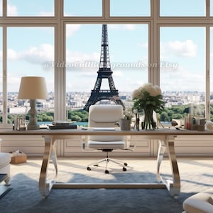 May include: A white office chair sits at a wooden desk with a view of the Eiffel Tower through a large window. The room is decorated in a modern style with white walls and a white sofa. The text "@VideoCallBackgrounds on Etsy" is visible in the window.