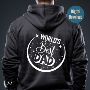 Może przedstawiać: Czarna bluza z kapturem z białym kołem graficznym z tyłu. Grafika przedstawia półksiężyc z gwiazdami i tekstem "WORLD'S BEST DAD".