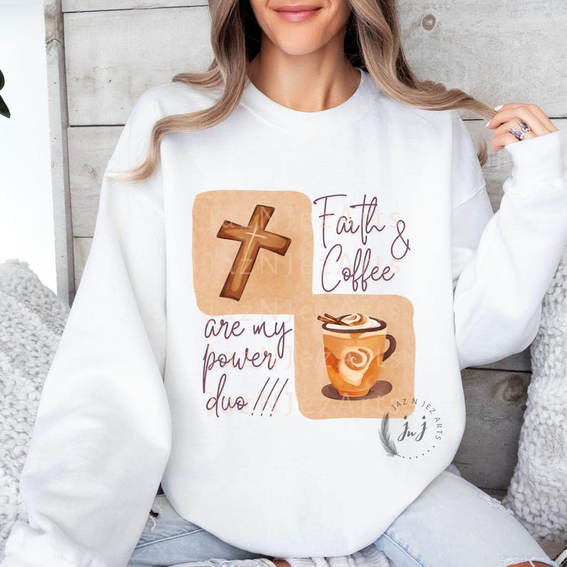 May include: White sweatshirt with a graphic design featuring a cross, a cup of coffee, and the text "Faith & Coffee are my power duo!!!"