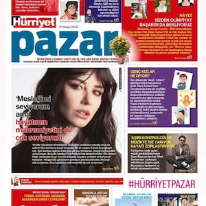 May include: A magazine cover with the title "Hürriyet Pazar" and various articles. The cover features a woman's portrait, gymnasts, and articles with headlines like "Michael Jackson's Play..." and "Which Countries Can Declare Digital Sovereignty?"
