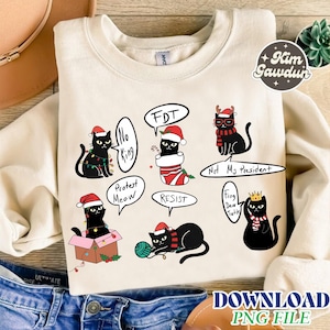 May include: A cream-coloured sweatshirt with black cat illustrations wearing Santa hats and speech bubbles. The speech bubbles say "No King," "FDT," "Protest Meow," "Resist," "Not My President," and "Frog Dear Turtle." The words "DOWNLOAD PNG FILE" are at the bottom.