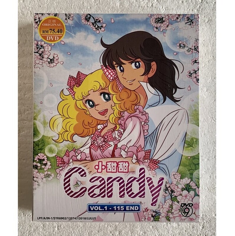 May include: A DVD cover featuring the anime Candy Candy. The cover art shows Candy and Anthony, two main characters from the series, standing together in a field of pink cherry blossoms. The title "Candy Candy" is written in Japanese and English, and the DVD volume number is "Vol. 1-115 End".