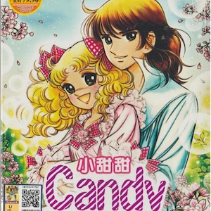 May include: A DVD cover featuring a pink and white striped design with the text "Candy" in a pink and white striped font. The cover also features a cartoon image of two people, a girl with blonde hair and a boy with brown hair. The text "Vol. 1 - 115 End" is also on the cover.