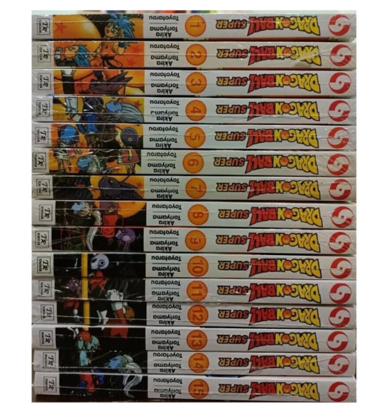 K&ouml;nnte beinhalten: Ein Stapel von 15 Dragon Ball Super Manga-B&auml;nden mit einem bunten Cover, das den Titel und einen Charakter aus der Serie zeigt. Die B&auml;nde sind von 1 bis 15 nummeriert.
