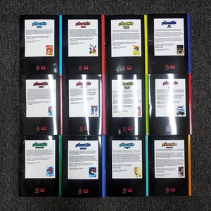 May include: A set of 10 Phoenix comic books, each with a different colored cover. The covers feature a black background with white text and a colorful illustration. The titles of the comics are "Phoenix #1", "Phoenix #2", "Phoenix #3", "Phoenix #4", "Phoenix #5", "Phoenix #6", "Phoenix #7", "Phoenix #8", "Phoenix #9", and "Phoenix #10".