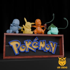 May include: A wooden framed sign featuring the word "Pokémon" in yellow and blue, with four character figurines on top. The figurines include Squirtle, Pikachu, Charmander, and Bulbasaur. The sign has a black background.