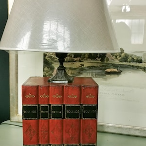 Lamp with leather-colored fake book base, vintage design, Italian craftsmanship, sold without lampshade.