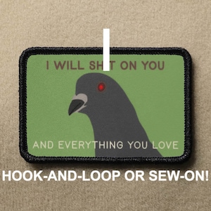Puede incluir: Un parche rectangular con fondo verde y borde negro. Presenta una paloma gris con ojos rojos y el texto "I WILL SHIT ON YOU AND EVERYTHING YOU LOVE." El texto inferior dice "HOOK-AND-LOOP OR SEW-ON!"