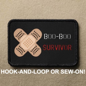May include: Black patch with a white bandage and the text "BOO-BOO SURVIVOR" in red. The patch is for hook-and-loop or sew-on.