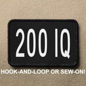 May include: Black rectangular patch with white text reading "200 IQ." The patch has a black border and the text "HOOK-AND-LOOP OR SEW-ON!" below the main text. The patch is on a tan background.