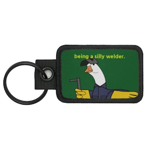 Spawarka Tig Mig Stick - seria Silly Goose Jobs - zabawny brelok z taktycznym morale - kolekcja breloków od LUMOLA STUDIO