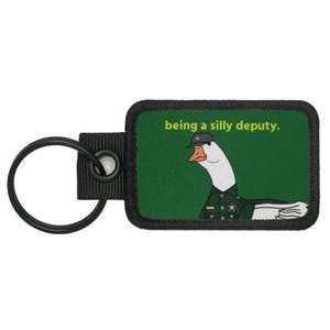 Agente del orden público n.° 1 - Serie de trabajos tontos de ganso - Llavero de moral táctica con meme divertido - Colección de llaveros de LUMOLA STUDIO