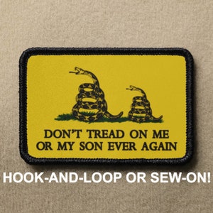May include: A yellow patch with a black border featuring two coiled snakes with the text "DON'T TREAD ON ME OR MY SON EVER AGAIN". The patch is available with hook-and-loop or sew-on backing.