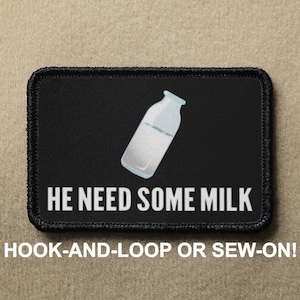May include: Black and white iron-on patch with a cartoon milk carton and the text "HE NEED SOME MILK".