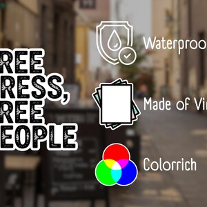 May include: A white sticker with the text "FREE PRESS, FREE PEOPLE" in a bold, black font. Additional text indicates the sticker is waterproof, made of vinyl, and colour-rich. The background is a blurred outdoor scene.