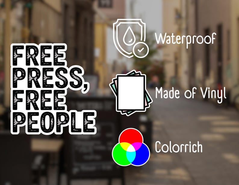 May include: A white sticker with the text "FREE PRESS, FREE PEOPLE" in a bold, black font. Additional text indicates the sticker is waterproof, made of vinyl, and colour-rich. The background is a blurred outdoor scene.