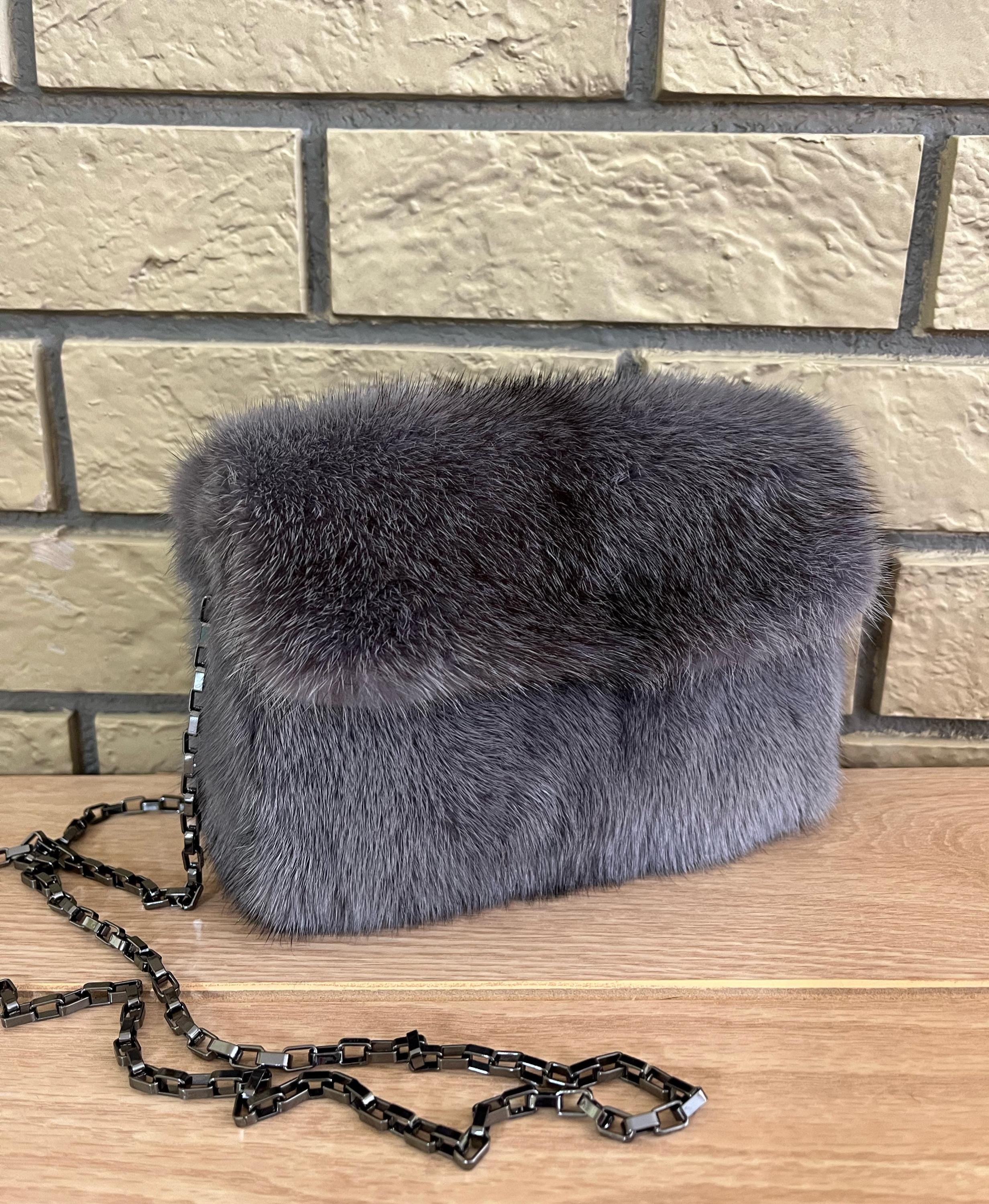 Grey fluffy clutch bag outlet