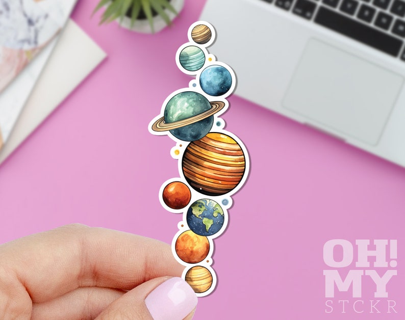 May include: A sticker featuring a watercolor illustration of the planets in our solar system. The planets are arranged vertically, with the largest planet at the bottom and the smallest planet at the top. The planets are painted in realistic colors, with details like rings and craters.