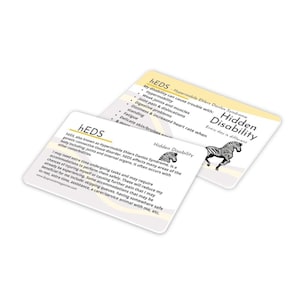 May include: Two cards with a yellow background and white text. The top card has the text "HEDS - Hypermobile Ehlers Danlos Syndrome Hidden Disability Every day is different" and a zebra illustration. The bottom card has the text "HEDS Hidden Disability" and a zebra illustration. The text on the cards describes the condition and its impact on daily life.
