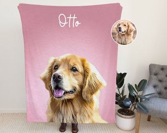 May include: A pink fleece blanket with a personalized illustration of a golden retriever dog named Otto. The blanket is soft and cozy, perfect for cuddling up on the couch.