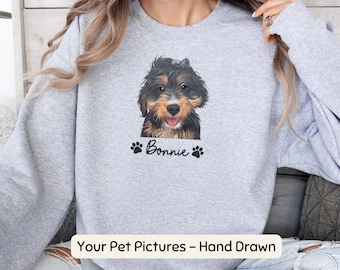 May include: Gray sweatshirt with a hand-drawn illustration of a brown and black dog with the name "Bonnie" printed below. The text "Your Pet Pictures - Hand Drawn" is printed at the bottom of the image.