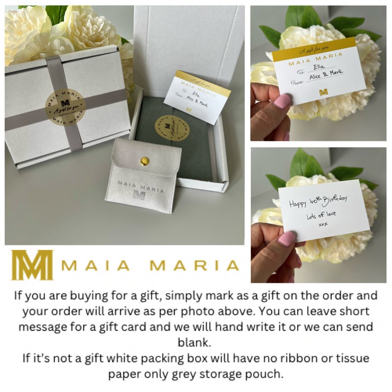 Puede incluir: Una caja de regalo blanca con una bolsa de almacenamiento gris y una tarjeta de regalo escrita a mano que dice "Feliz cumplea&ntilde;os n&uacute;mero 40 Mucho amor xxx". La caja est&aacute; decorada con una cinta dorada y una peque&ntilde;a pegatina dorada con el texto "MAIA MARIA".