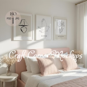 May include: A bedroom scene featuring a pink bed with white bedding and decorative pillows. Above the bed are three framed art prints with minimalist line drawings of a lamp, a dove, and a flower. The text "Craft Corner Mockups" is visible.