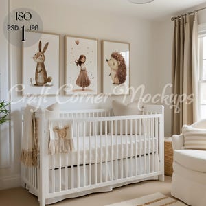 May include: White crib with a white and brown blanket and a white chair with a brown and white pillow in a nursery with three framed illustrations of a rabbit, a girl, and a hedgehog.