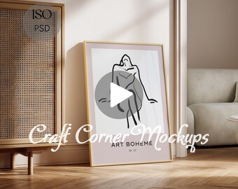 May include: A framed art print featuring a minimalist line drawing of a figure in a dress, set against a gray circle. The print is in a gold frame and leans against a wall. The text "Craft Corner Mockups" is visible.