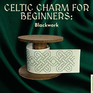 May include: A wooden spool with a white ribbon printed with a blackwork Celtic knot design. The text "Celtic Charm for Beginners: Blackwork" is above the spool.