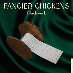 May include: A white paper scroll with a blackwork design is rolled around a wooden spool. The scroll is labeled "Fancier Chickens Blackwork".