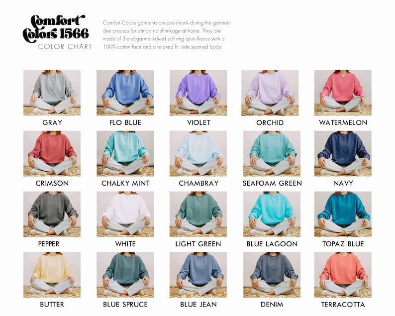 May include: Color chart showing 15 different colors of Comfort Colors 1566 sweatshirts. The sweatshirts are laid out in rows of five, with each sweatshirt folded and sitting on a light brown surface. The colors include gray, flo blue, violet, orchid, watermelon, crimson, chalky mint, chambray, seafoam green, navy, pepper, white, light green, blue lagoon, topaz blue, butter, blue spruce, blue jean, denim, and terracotta.