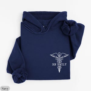 Custom Registered Nurse Sweatshirt With Name, Personalized RN Pocket Hoodie, Nurse Life Outfit, Nurse Appreciation Clothing, Cute Nurse Gift