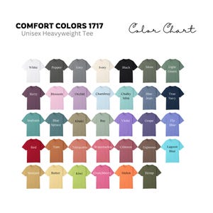 Op de afbeelding: Kleurenkaart met 36 verschillende kleuren van unisex zware t-shirts. De kleuren zijn gerangschikt in rijen en kolommen, met de namen van elke kleur onder het bijbehorende t-shirt.