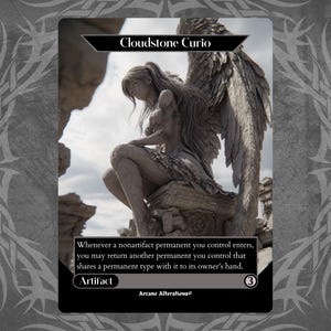 May include: A fantasy card titled "Cloudstone Curio" featuring a stone statue of a winged figure. The card has a black border with white text describing its function. The background is a blurred outdoor scene with rocks and sky.
