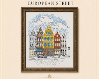 May include: A cross-stitch pattern titled EUROPEAN STREET featuring a row of colourful buildings in yellow, red, brown, and white. The design includes a blue sky with white clouds, a street lamp, and a small outdoor cafe scene, all framed in a dark ornate wooden frame.