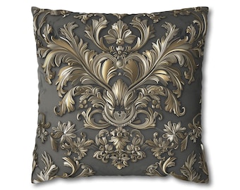 May include: A square throw pillow featuring a dark charcoal grey background with a symmetrical, raised-relief pattern in metallic gold. The design consists of intricate, swirling acanthus leaves and floral motifs that create a textured appearance.