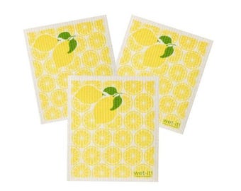 May include: Three yellow and white cleaning cloths with a lemon theme. Each cloth features a large lemon with green leaves and a background of lemon slices. The words "WET-IT!" are printed on the bottom right corner of two cloths.