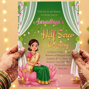 May include: An invitation card for Aaradhya's Half Saree Ceremony. The card features a cartoon illustration of a woman in traditional Indian attire, seated on a lotus flower. The background is green with floral and curtain elements.