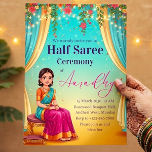 May include: An invitation for a Half Saree Ceremony. The invitation features a cartoon illustration of a woman in traditional Indian attire, with text that reads "Half Saree Ceremony of Aaradhy". The invitation is held by a hand.